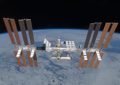 Visits the Space Station